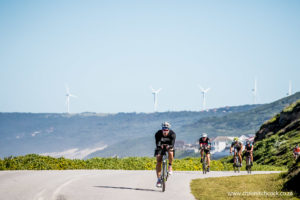 The wind generators in the background are there because there are always winds along this coast. This is where riders start to feel the first bit of hurt on lap one of the cycle. The smiles will be completely gone by lap two.